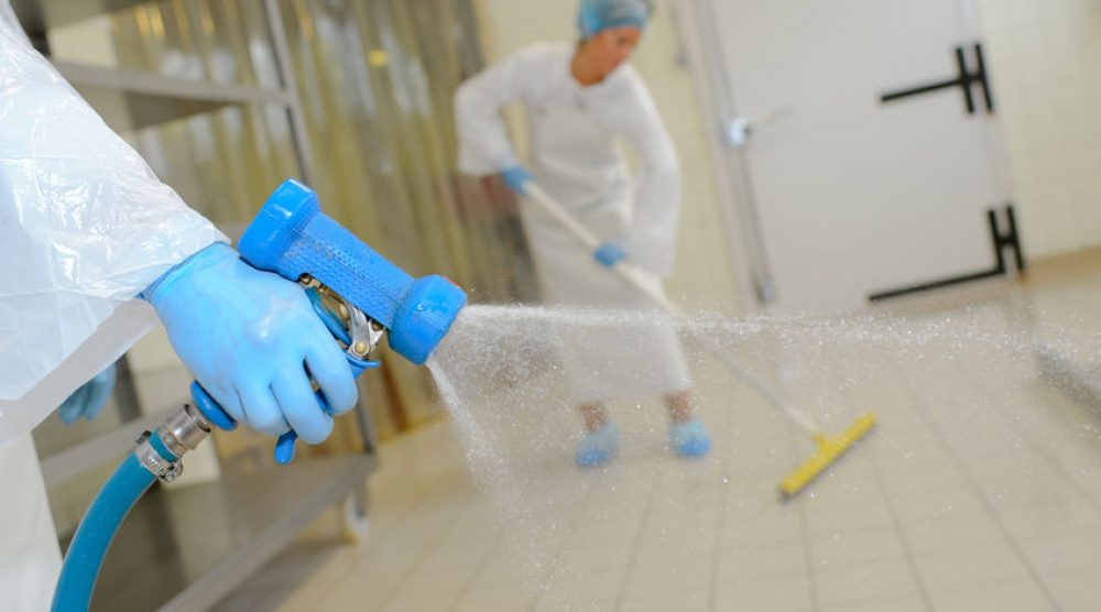 Hosing down a factory floor